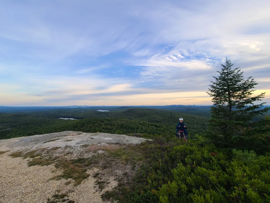 Me, atop a climb at Chick Hill, ME -- my first multipitch trad that I led. 